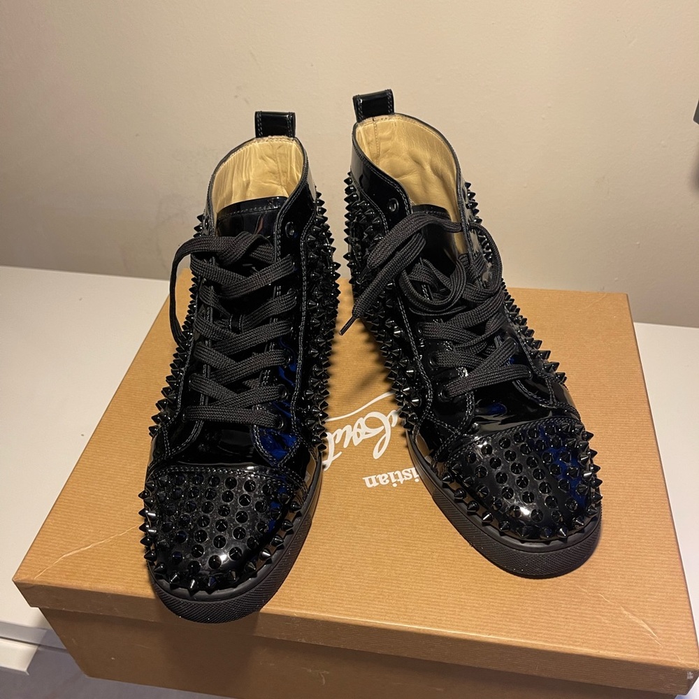 CHRISTIAN LOUBOUTIN
Black Louis Spikes High-Top Sneakers